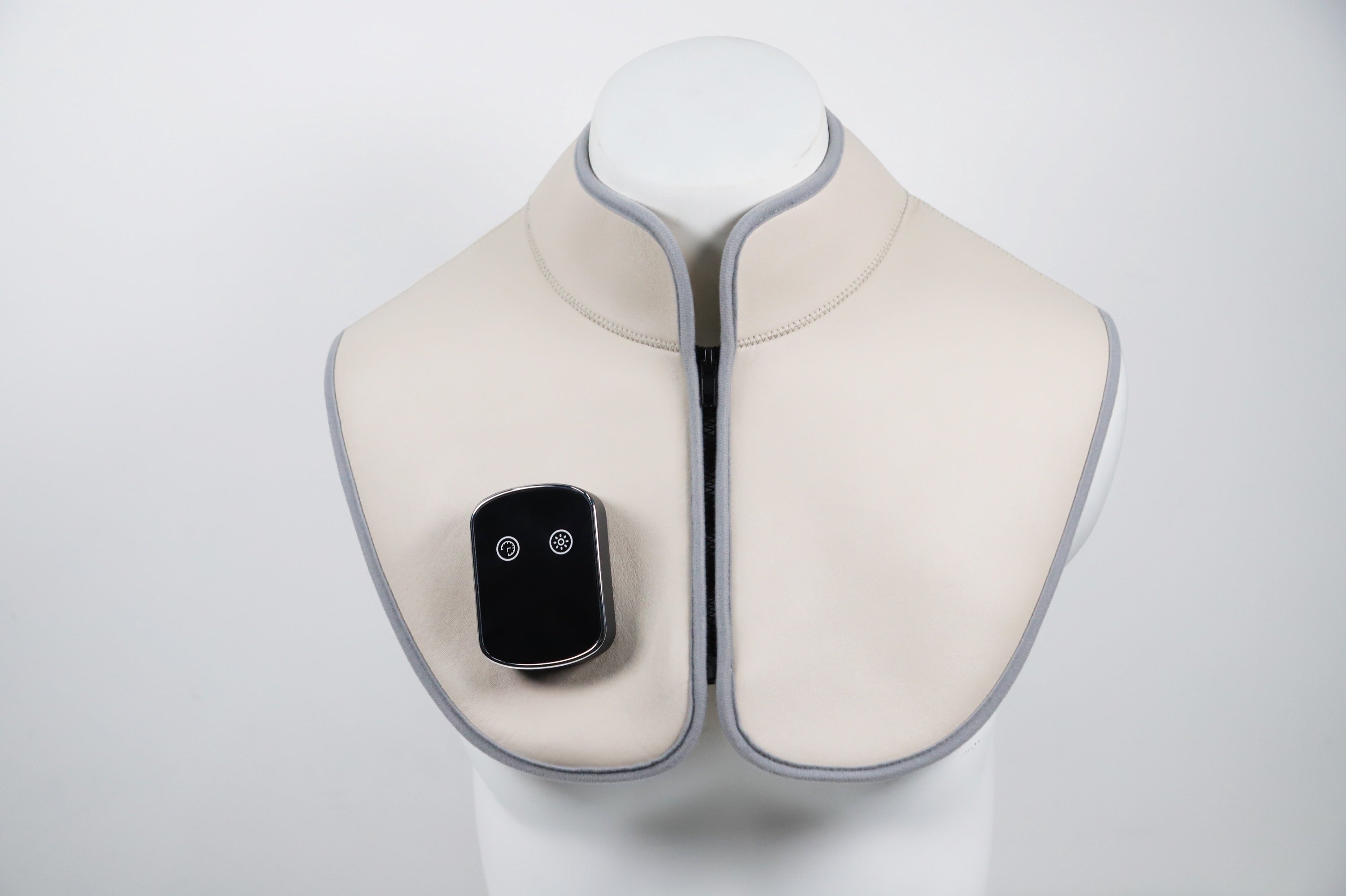 Red light therapy neck and shoulder wrap worn over the shoulders